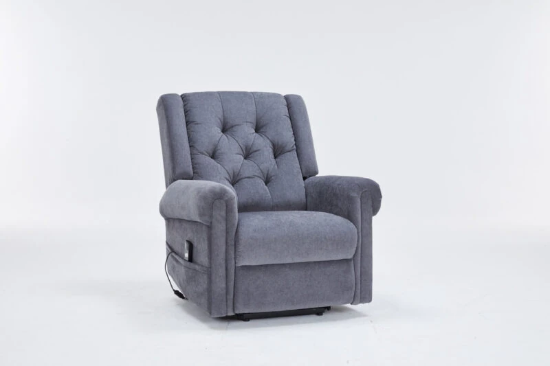Grey recliner chair with buttoned back design.