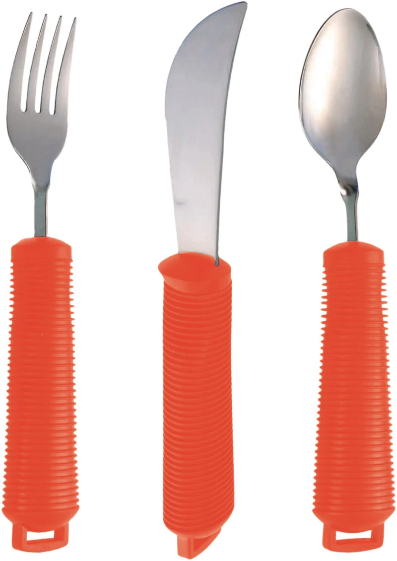Adaptive silverware set with red handles, including a fork, knife, and spoon.