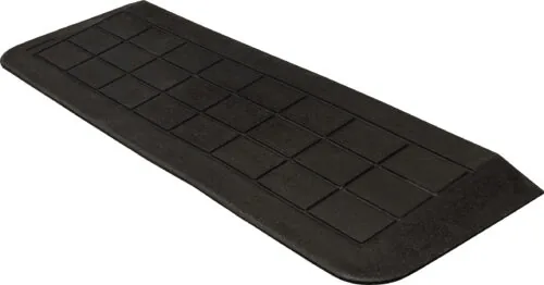 Black accessibility ramp with a textured surface.