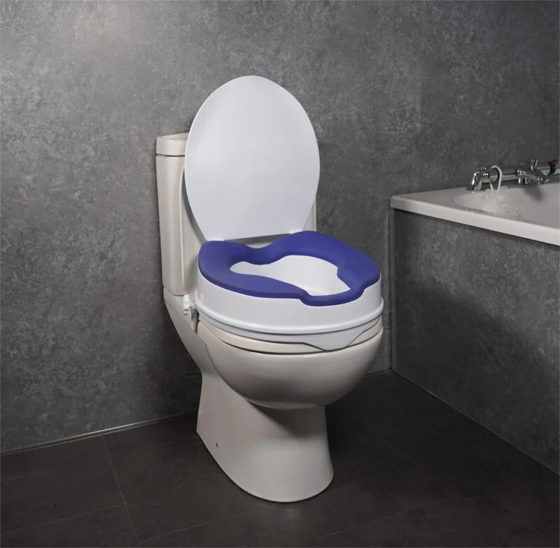 Elevated toilet seat with blue TPR padding and lid in a bathroom setting.
