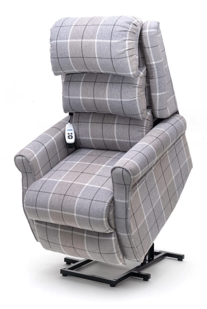 Gray plaid recliner chair with remote control attached.