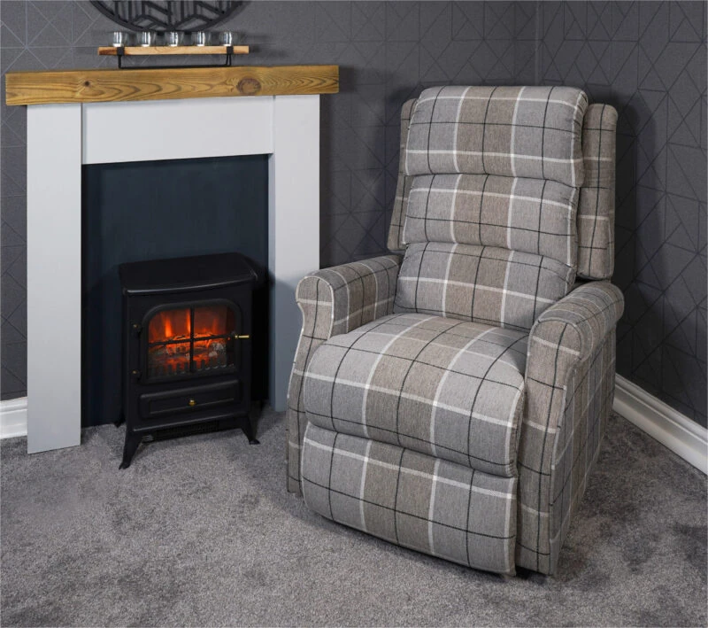 Armchair with Glen Check fabric next to a fireplace.