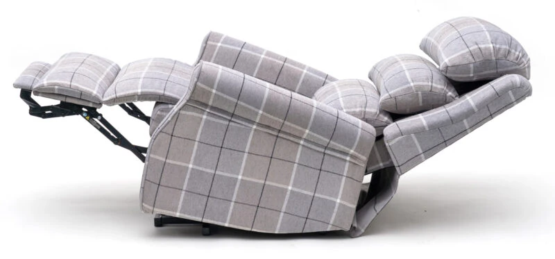 Armchair in Glen Check fabric fully reclined with visible steel frame.
