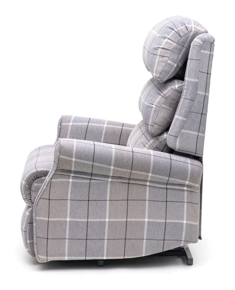 Side view of a Glen Check fabric recliner chair.