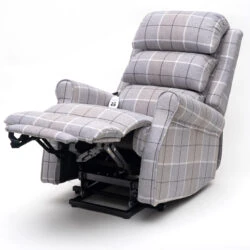 Gray plaid riser recline armchair with extended footrest.