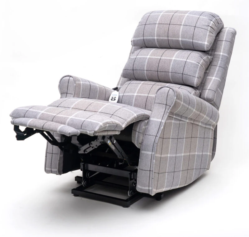 Gray plaid riser recline armchair with extended footrest.