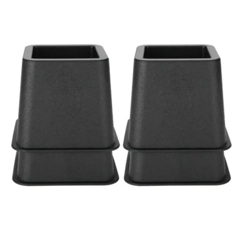 Two black square furniture raisers stacked together.