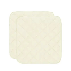 Two quilted chair pads with a diamond pattern.