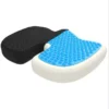 Black and blue gel wheelchair cushion with ergonomic design.