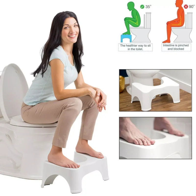 Woman using a toilet foot stool with ergonomic design.