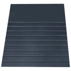 Black accessibility ramp with grooved surface.