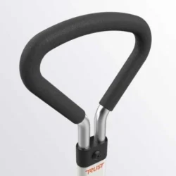 Close-up of a padded ergonomic handle on a bed support rail.