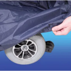 Navy blue cover being placed over a scooter wheel.