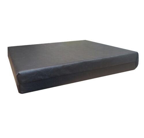 Black wheelchair cushion with a smooth surface.