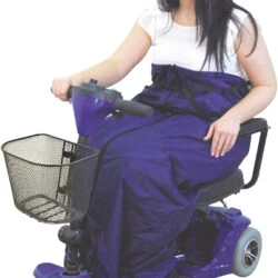 Person using a mobility scooter with a fleece-lined cosy.