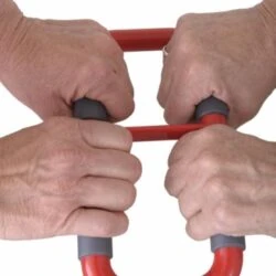 Two pairs of hands gripping a red ergonomic handle with gray non-slip grips.