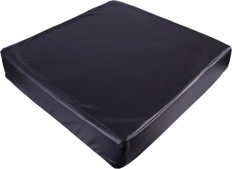 Black vinyl wheelchair cushion with smooth surface.