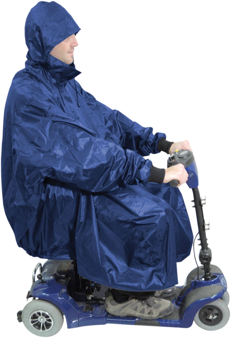 Person wearing a blue waterproof poncho on a mobility scooter.
