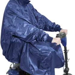 Person wearing a blue waterproof poncho on a mobility scooter.