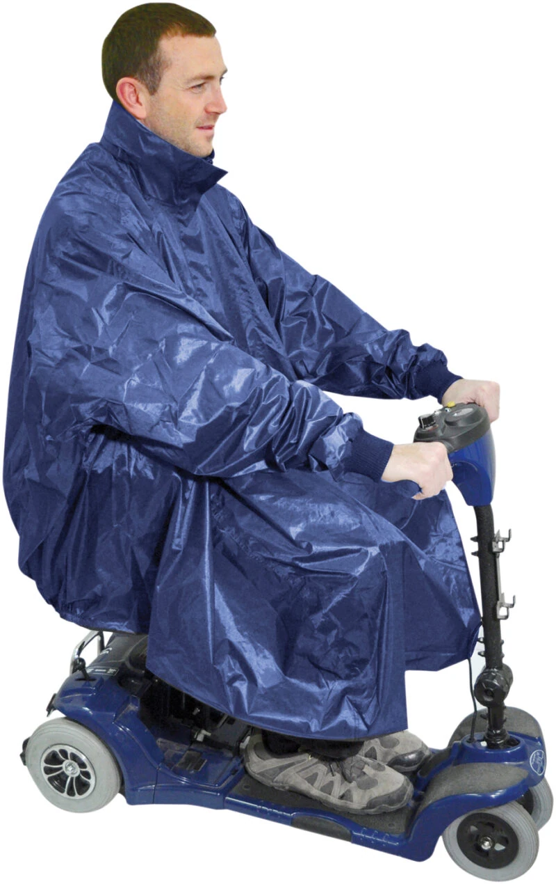 Person wearing a blue waterproof poncho on a mobility scooter.
