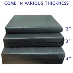Three stacked wheelchair cushions in varying thicknesses: 2, 3, and 4 inches.