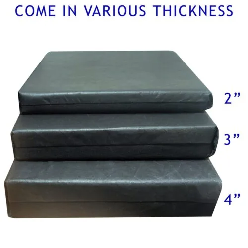 Three stacked wheelchair cushions in varying thicknesses: 2, 3, and 4 inches.