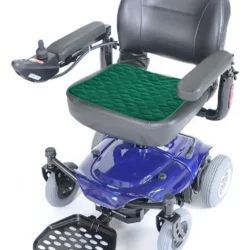 Green incontinence chair pad on a mobility scooter seat.