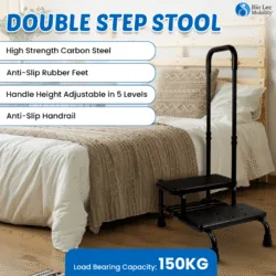 Double step stool with handle next to a bed, featuring anti-slip steps.