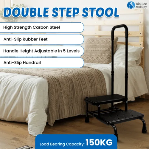 Double step stool with handle next to a bed, featuring anti-slip steps.