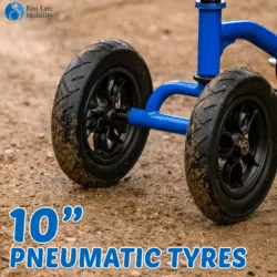 Close-up of knee walker scooter's pneumatic tyres on a dirt path.