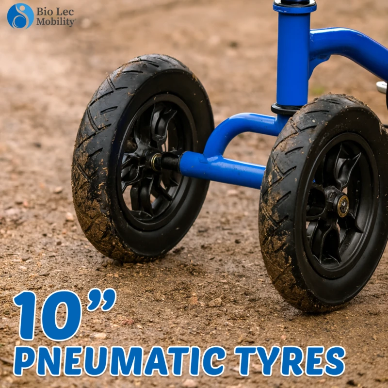 Close-up of knee walker scooter's pneumatic tyres on a dirt path.