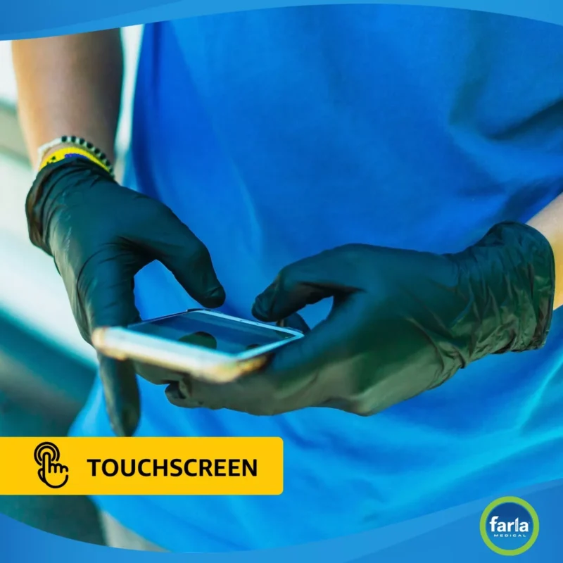 Person wearing black gloves using a smartphone.