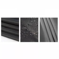 Close-up of waterproof black fabric with water droplets.