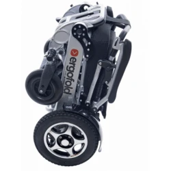 Folded Ergofold Elite electric wheelchair showing compact design.