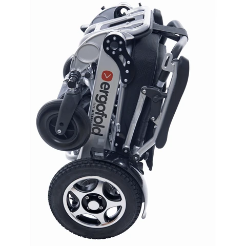 Folded Ergofold Elite electric wheelchair showing compact design.