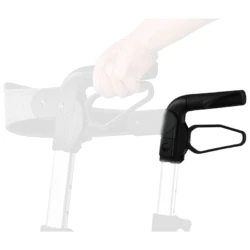 Close-up of a hand gripping a rollator handle.