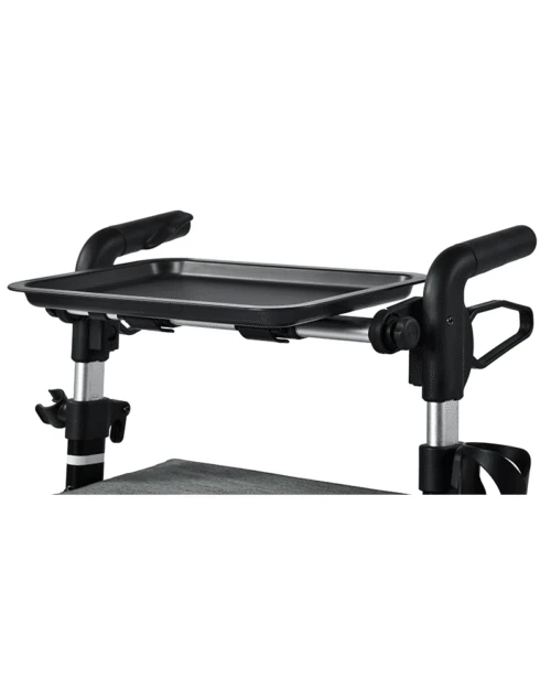 Tray accessory attached to a rollator walker.