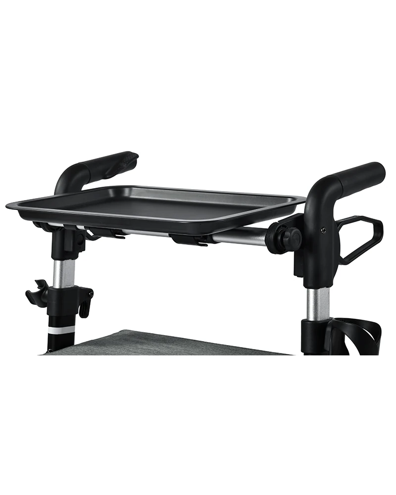 Tray accessory attached to a rollator walker.
