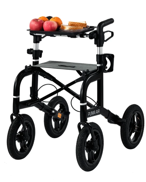 Mobilex Puma Air Rollator with a tray holding fruit and sandwiches.