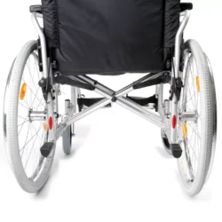 Rear view of a folding bariatric wheelchair with cross-braced steel frame.