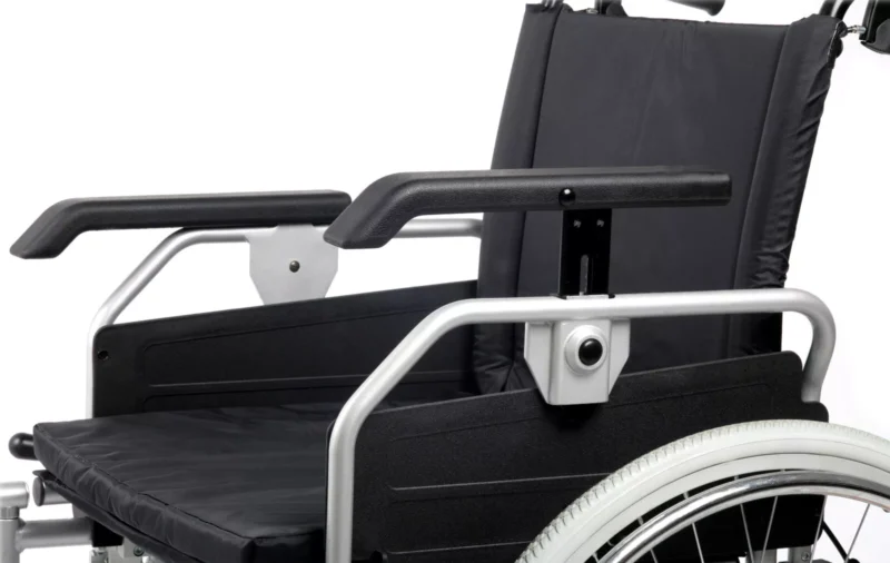 Close-up of the armrests and seat of a bariatric wheelchair.