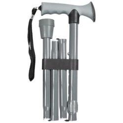 Folded grey walking stick with a soft gel handle and wrist strap.