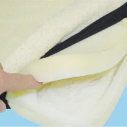 Close-up of gel seat cushion layers with fleece cover.