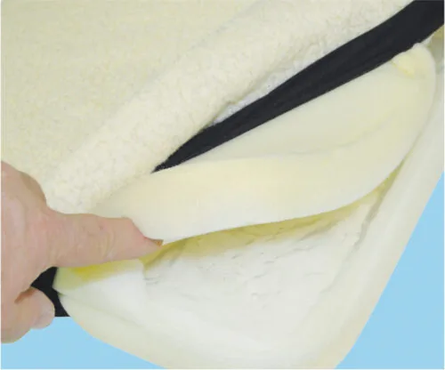 Close-up of gel seat cushion layers with fleece cover.