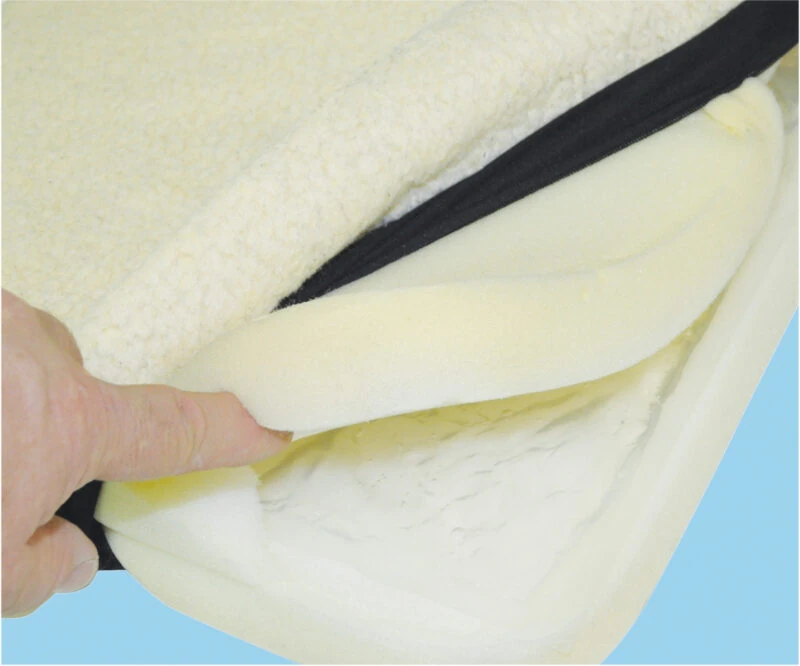 Close-up of gel seat cushion layers with fleece cover.