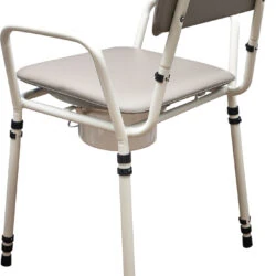 Height adjustable commode chair with padded seat and backrest, viewed from the back.