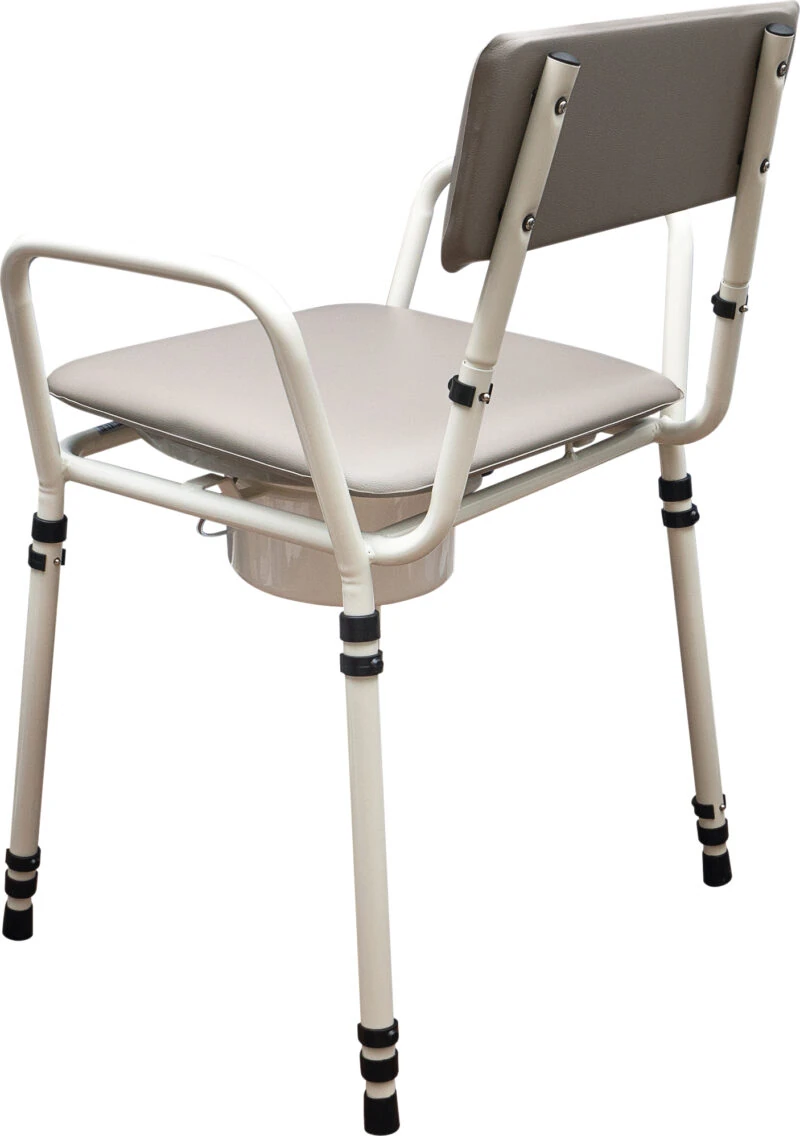 Height adjustable commode chair with padded seat and backrest, viewed from the back.