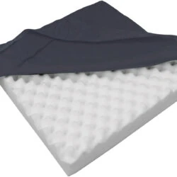 Orthopaedic seat cushion with eggcrate foam and black cover.