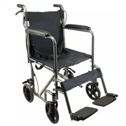 Folding transit wheelchair with padded armrests and footrests.