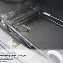 Foldable wheeled walker with seat stored in a car trunk.